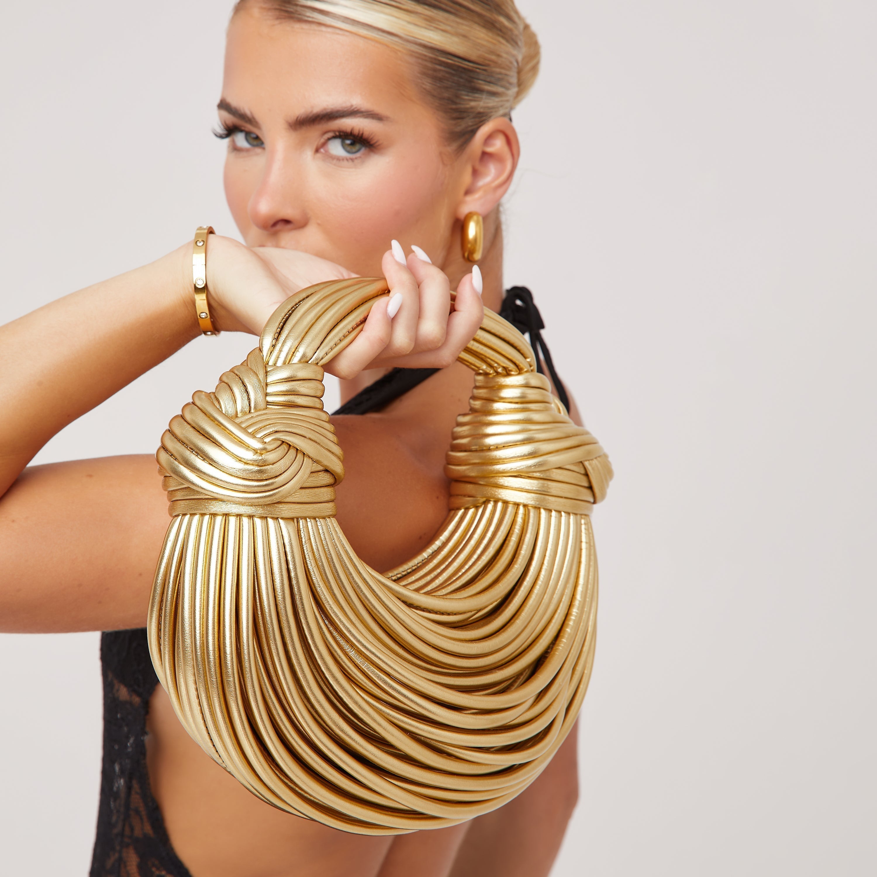 Clinbands - Luxuriöse Statement-Tasche mit elegantem Design