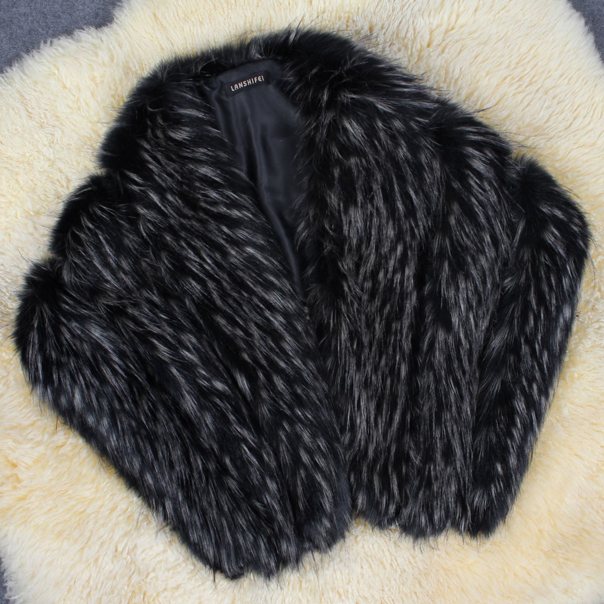 Damen Eleganter Kunstpelz-Cape Clinbands