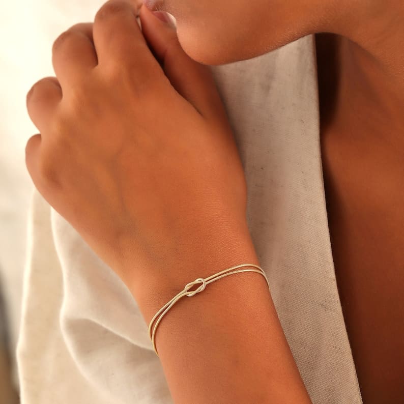 Clinbands | Elegantes Liebesknoten Armband für Damen